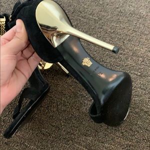 Gold and black Versace heels